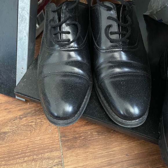 3 pairs of boots and 1 pair of dress shoes